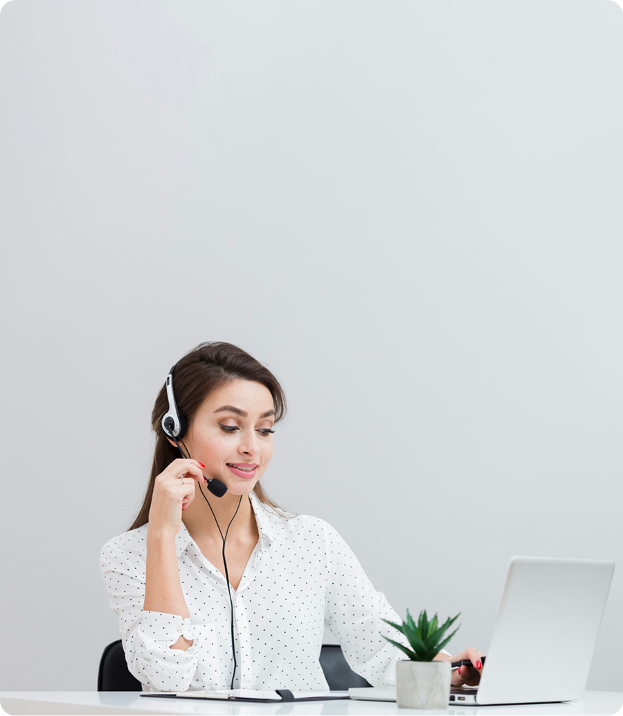 A person with a megaphone next to a laptop with envelopes